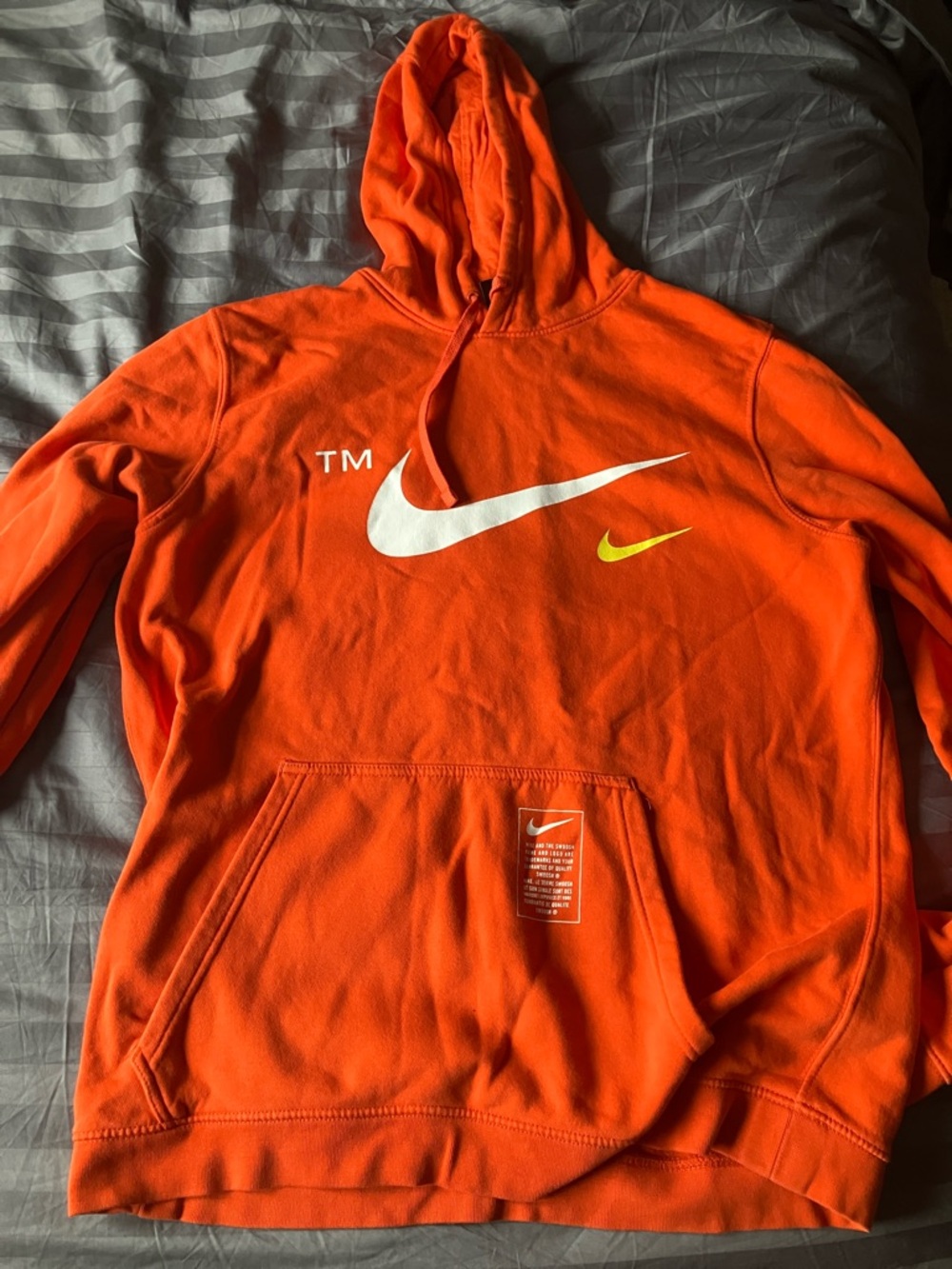 Nike Orange Hooded Sweatshirt with White and Yellow Swooshes
